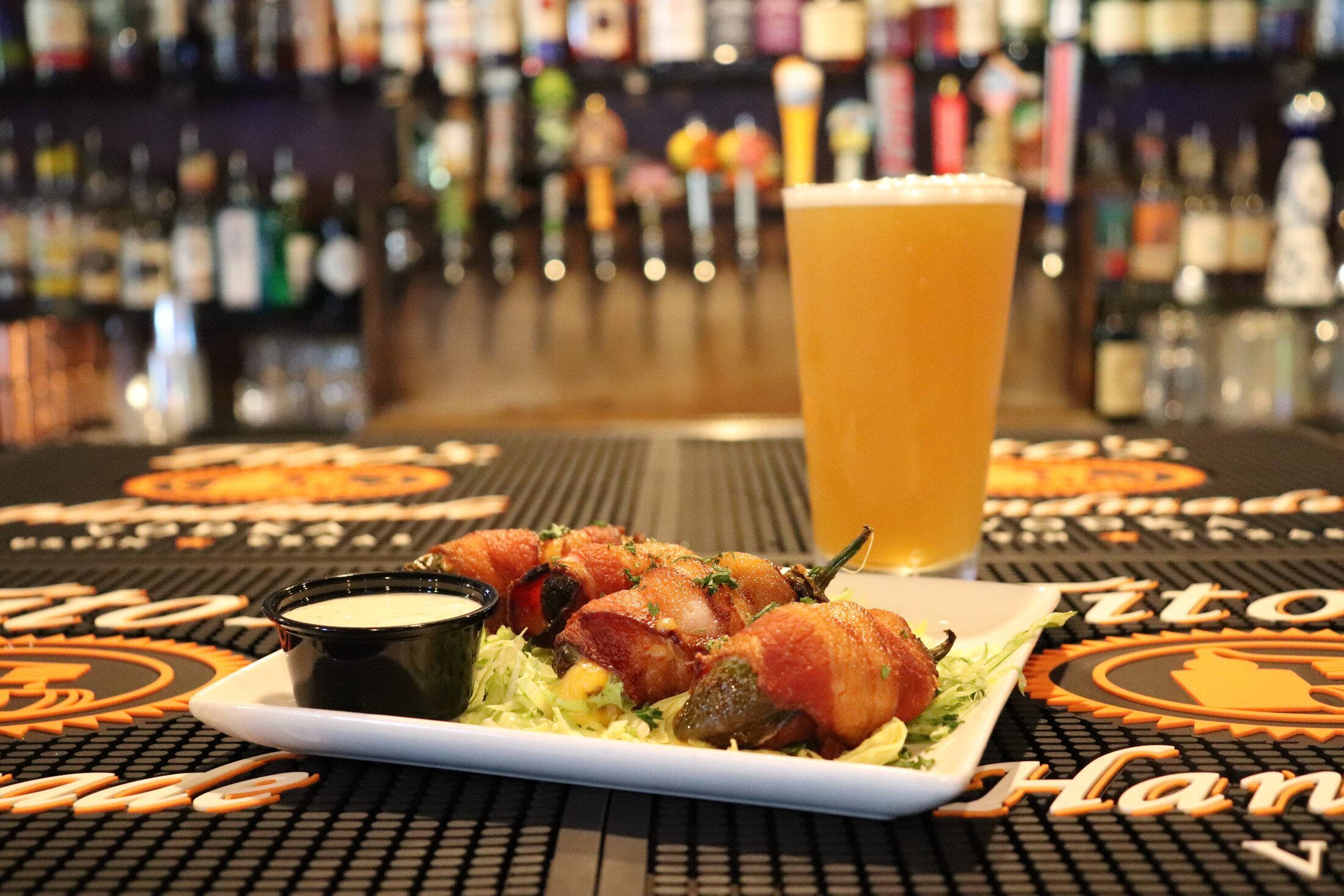 Bacon-wrapped jalapenos and a beer at Rooneys in Woodinville
