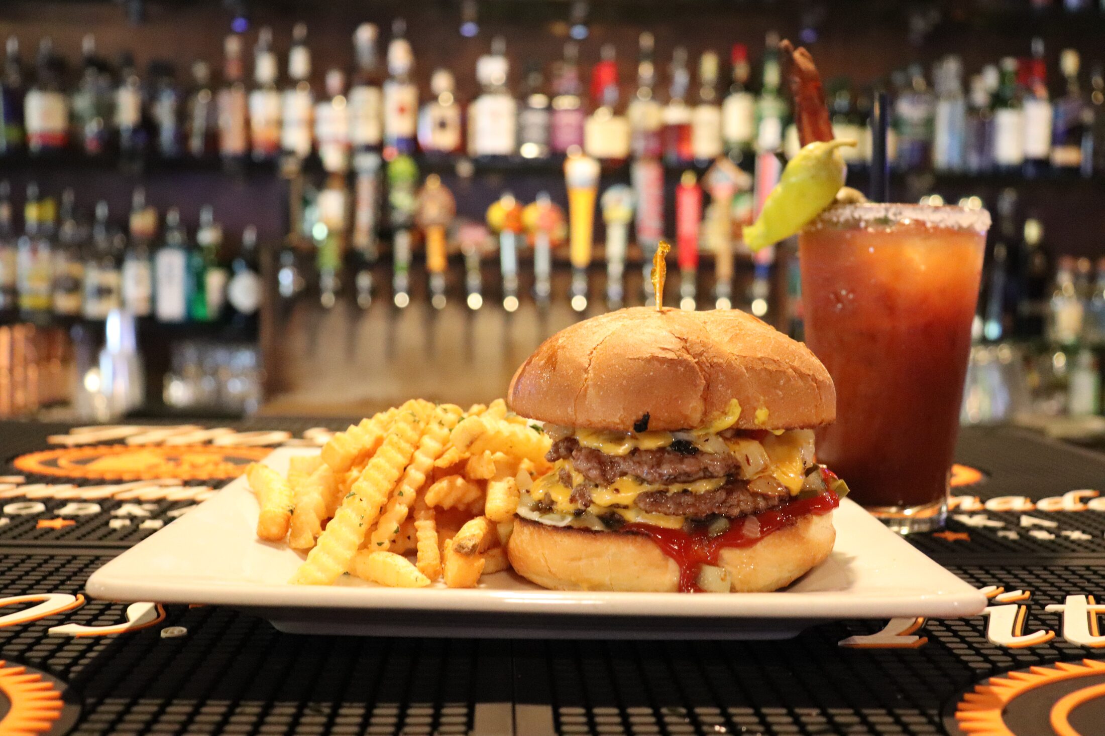 Double cheeseburger with fries and a bloody mary at Rooneys in Woodinville
