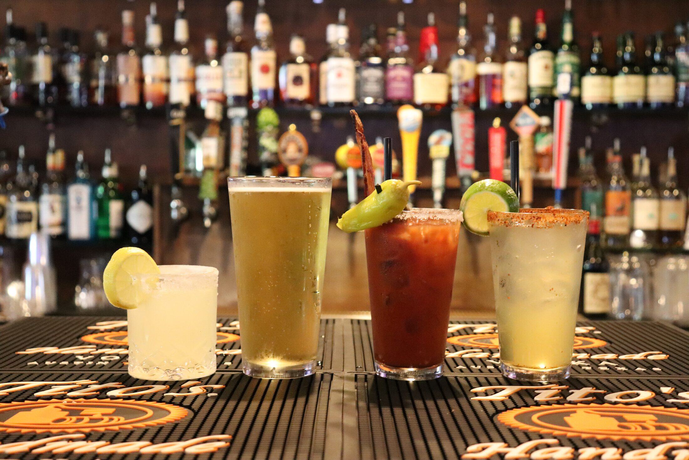 A lineup of cocktails, beer and bloody marys at Rooneys