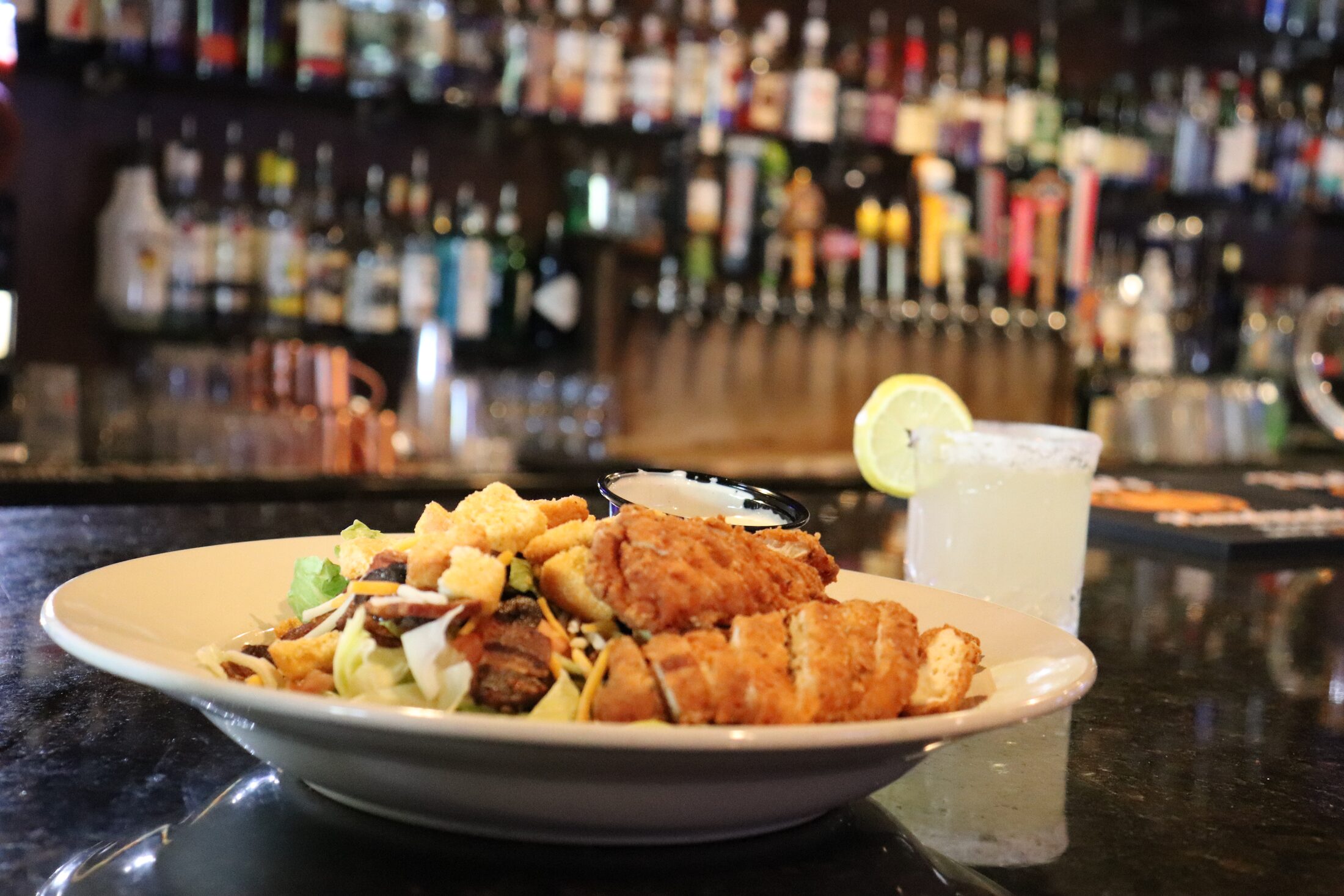 Fried chicken salad with a margarita at Rooneys
