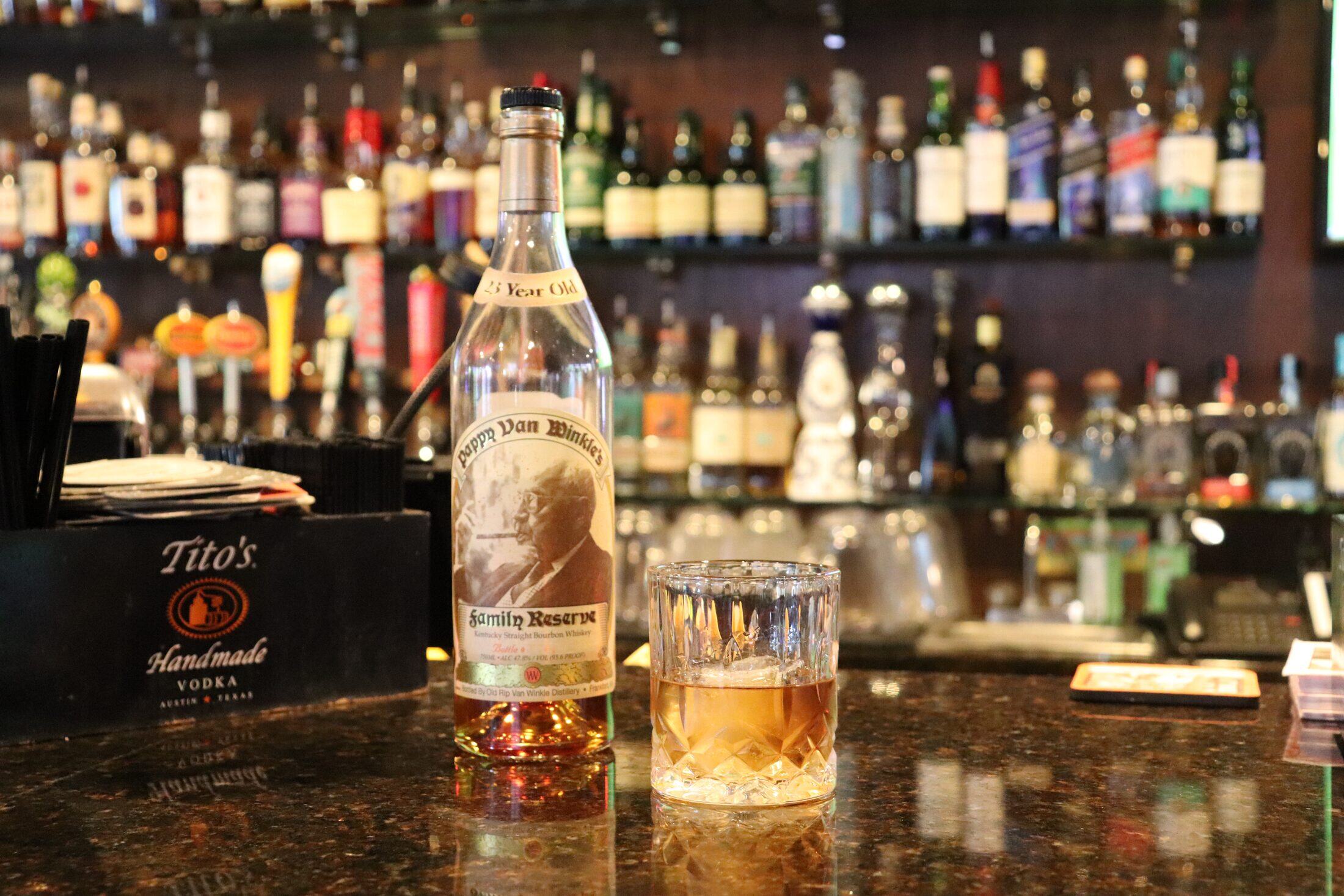 A pour of Pappy Van Winkle 23-year bourbon on Rooneys bar